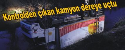 Kontrolden kan kamyon dereye utu