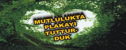 MUTLULUKTA PLAKAYI TUTTURDUK