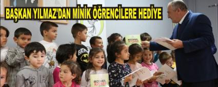 BAKAN YILMAZ'DAN MNK RENCLERE HEDYE