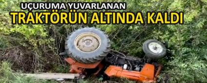 UURUMA YUVARLANAN TRAKTRN ALTINDA KALDI